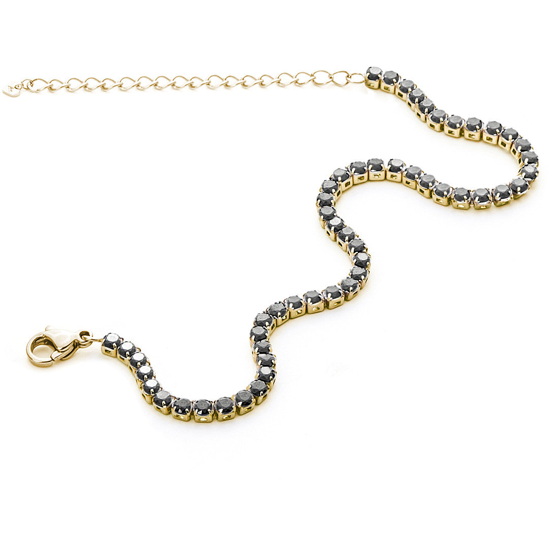 Bracciale da donna 4US Cesare Paciotti realizzato in acciaio inossidabile con maglia a catena groumette lucida. Il bracciale presenta due ciondoli pendenti: uno a forma di medaglietta circolare con logo traforato e l'altro a forma di pugnale tridimensionale.