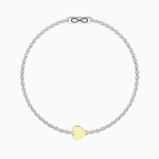 Bracciale rigido Kidult in acciaio silver lucido con ciondolo a forma di cuore pendente in oro rosa - Alfano Gioielli Gioielleria Palermo.