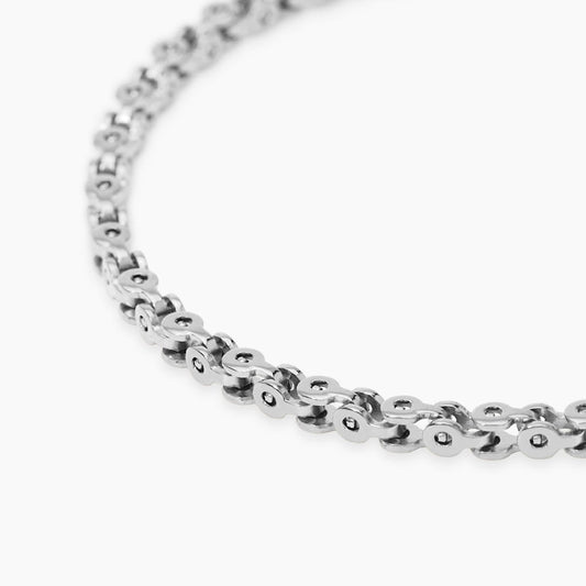 Bracciale a catenina Kidult in acciaio silver con piccole pietre naturali di quarzo rosa alternate.