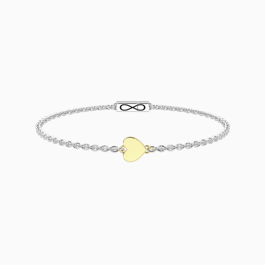 Bracciale rigido Kidult in acciaio silver lucido con ciondolo a forma di cuore pendente in oro rosa - Alfano Gioielli Gioielleria Palermo.