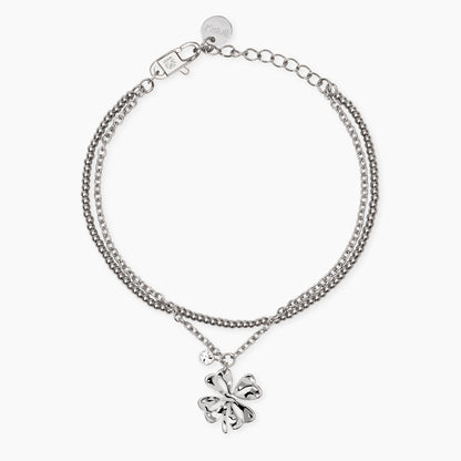 Bracciale Kidult in acciaio oro giallo con pietre naturali di quarzo rosa e ciondolo centrale a forma di cuore lucido.