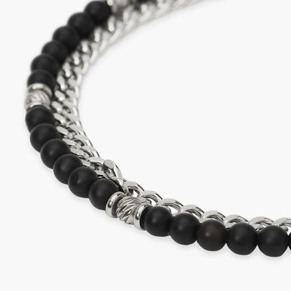 Bracciale a catenina Kidult in acciaio silver con piccole pietre naturali di agata rossa alternate lungo la struttura.