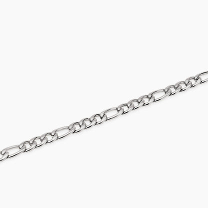 Bracciale a catenina Kidult in acciaio con finitura oro giallo e piccole pietre naturali di quarzo rosa alternate.