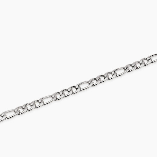 Bracciale a catenina Kidult in acciaio con finitura oro giallo e piccole pietre naturali di quarzo rosa alternate.