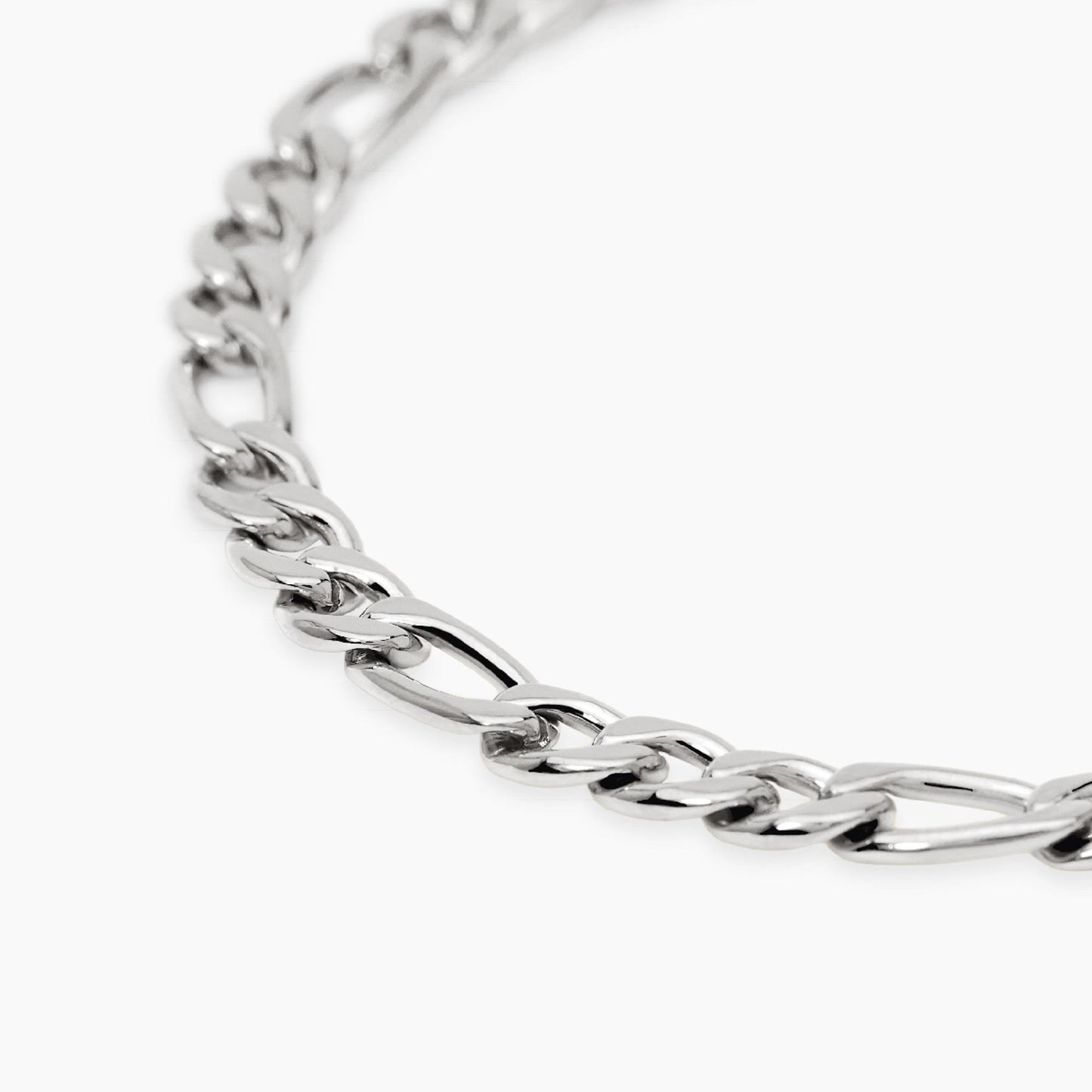 Bracciale a catenina Kidult in acciaio con finitura oro giallo e piccole pietre naturali di quarzo rosa alternate.