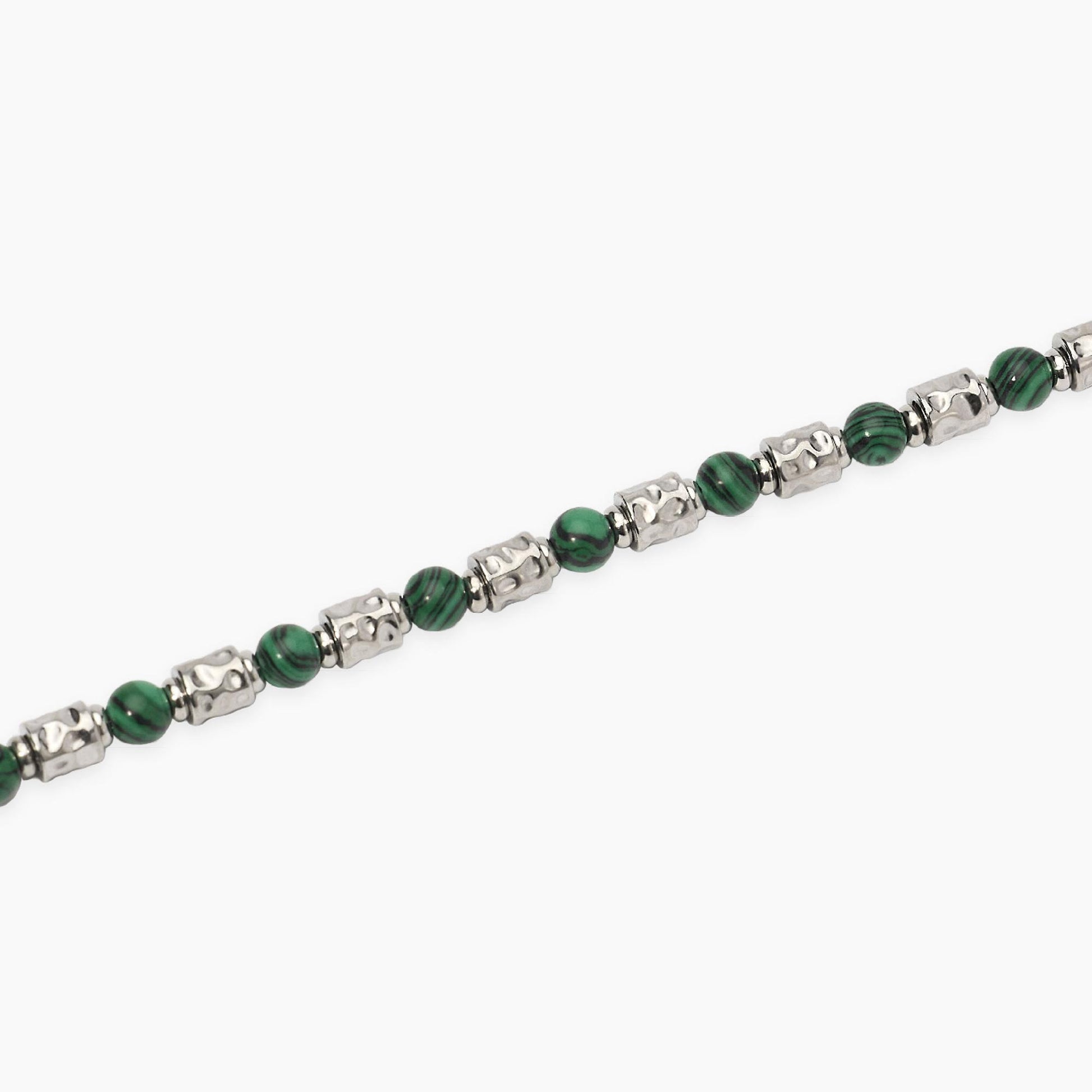 Bracciale a catena Kidult in acciaio dorato con piccole pietre naturali di apatite azzurra alternate.