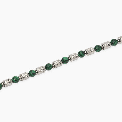 Bracciale a catena Kidult in acciaio dorato con piccole pietre naturali di apatite azzurra alternate.