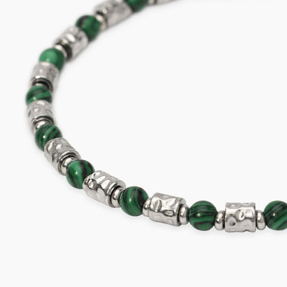 Bracciale a catena Kidult in acciaio dorato con piccole pietre naturali di apatite azzurra alternate.