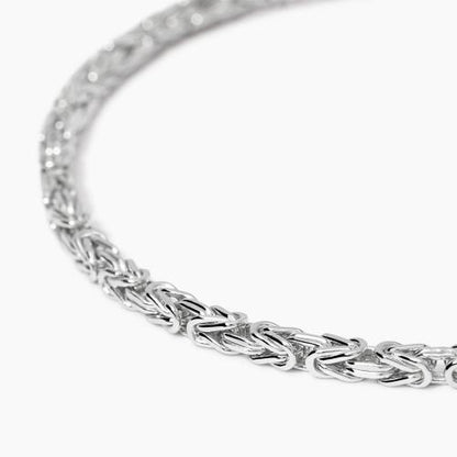 Bracciale da uomo Mabina in argento 925 con piastra centrale lucida e piccolo diamante lab grown incastonato.