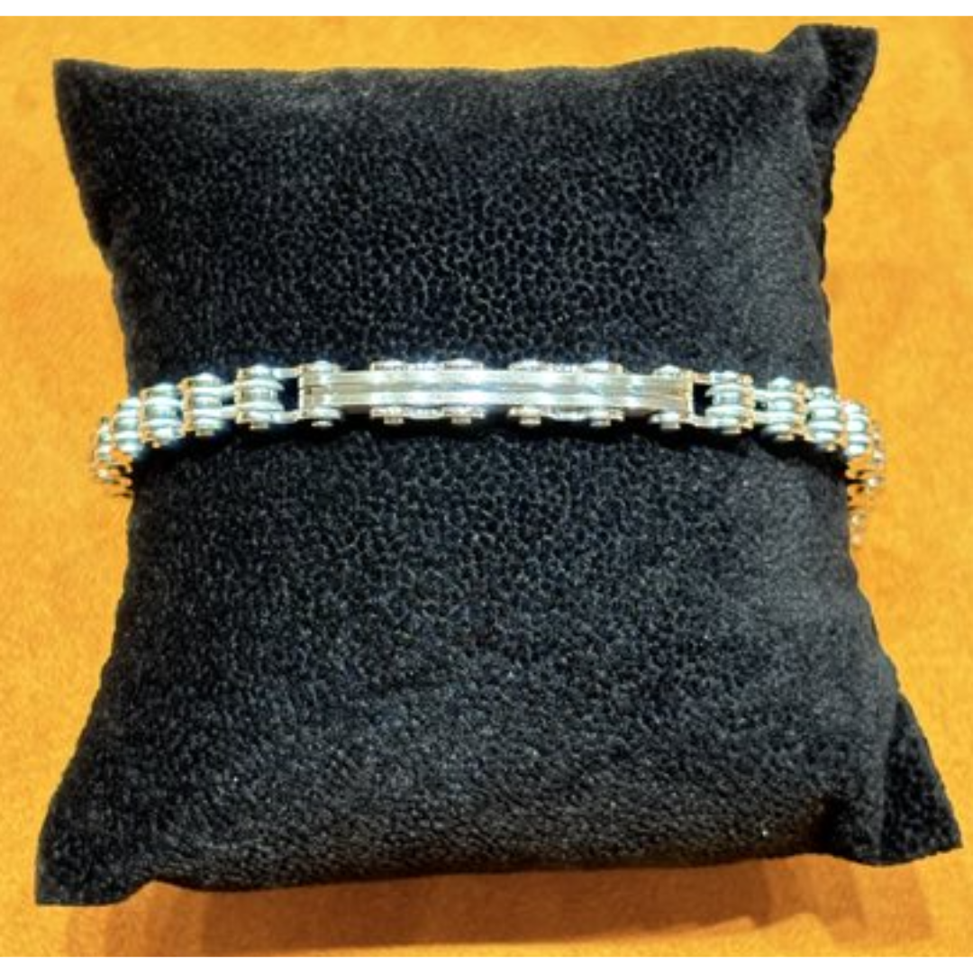Bracciale da uomo Zancan Insignia in argento 925 con piastra centrale lucida, due viti in oro rosa 18kt e uno spinello nero.