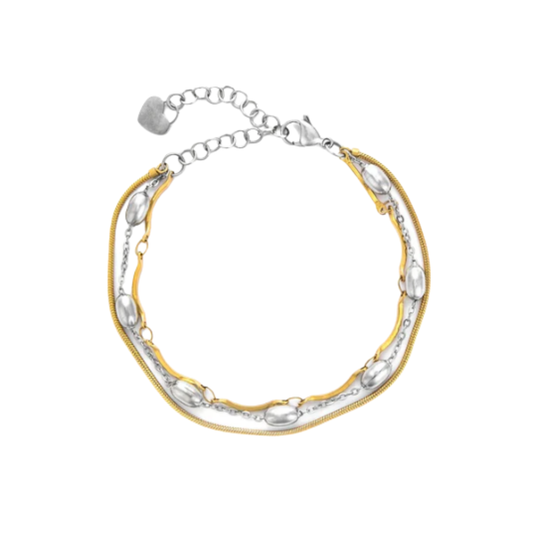 Bracciale da donna a catena in acciaio inossidabile lucido. Al centro della maglia groumette è presente un grande elemento circolare piatto interamente ricoperto da piccoli zirconi bianchi brillanti incastonati. Al centro del pavé spicca il simbolo del pugnale Cesare Paciotti, realizzato a rilievo tridimensionale in acciaio lucido.