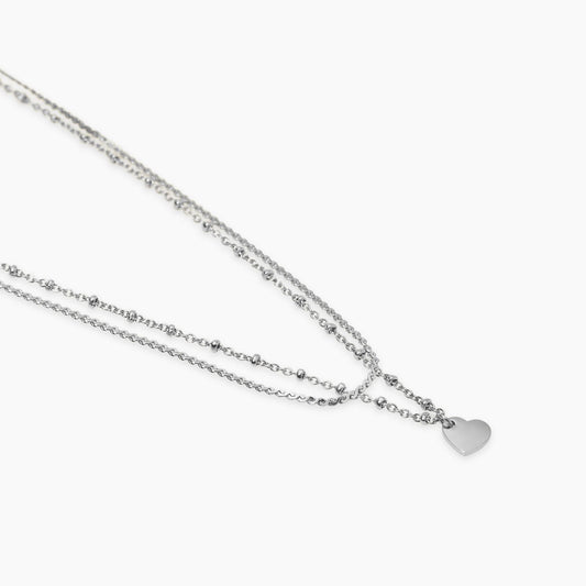 Collana Kidult a doppio filo in acciaio silver con catena rolò, serpentina e piccolo cuore pendente - Alfano Gioielli Gioielleria Palermo.