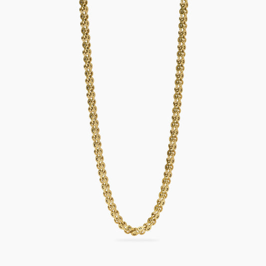 Collana a catenina Kidult in acciaio dorato con piccole sfere di quarzo rosa naturale alternate lungo il girocollo.