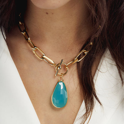 Collana Unoaerre Dorata con Cristallo Turchese 2037
