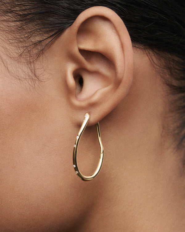 Orecchini a cerchio leggeri e sottili PDPaola Air Hoops in argento dorato 18K finitura lucida - Alfano Gioielli Gioielleria Palermo.