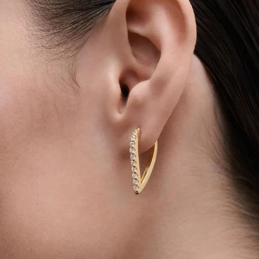 Orecchini pendenti PDPaola Gloss in argento dorato 18K con design a goccia fluida e pavé di zirconi - Alfano Gioielli Gioielleria Palermo.