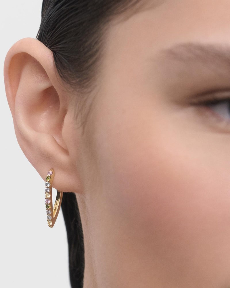 Orecchini pendenti scultorei PDPaola Multicolor Gloss in argento dorato 18K con zirconi colorati e design fluido - Alfano Gioielli Gioielleria Palermo.