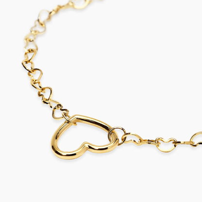 Bracciale Kidult Style 64 831216 in acciaio PVD oro giallo con catena a maglia di cuori e pendente centrale - Alfano Gioielli Palermo.