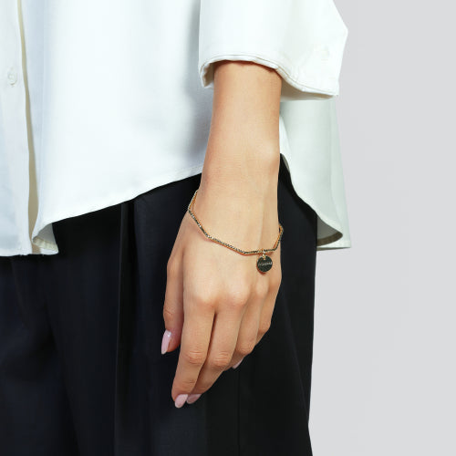 Bracciale rigido a schiava Unoaerre in bronzo placcato oro giallo 24K con lavorazione diamantata - Alfano Gioielli Gioielleria Palermo.